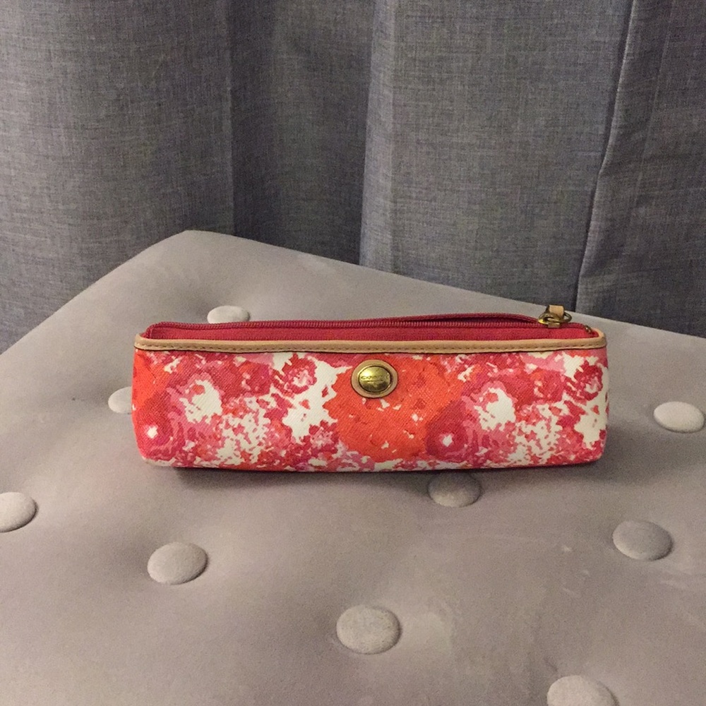 Gently used Coach pencil case.